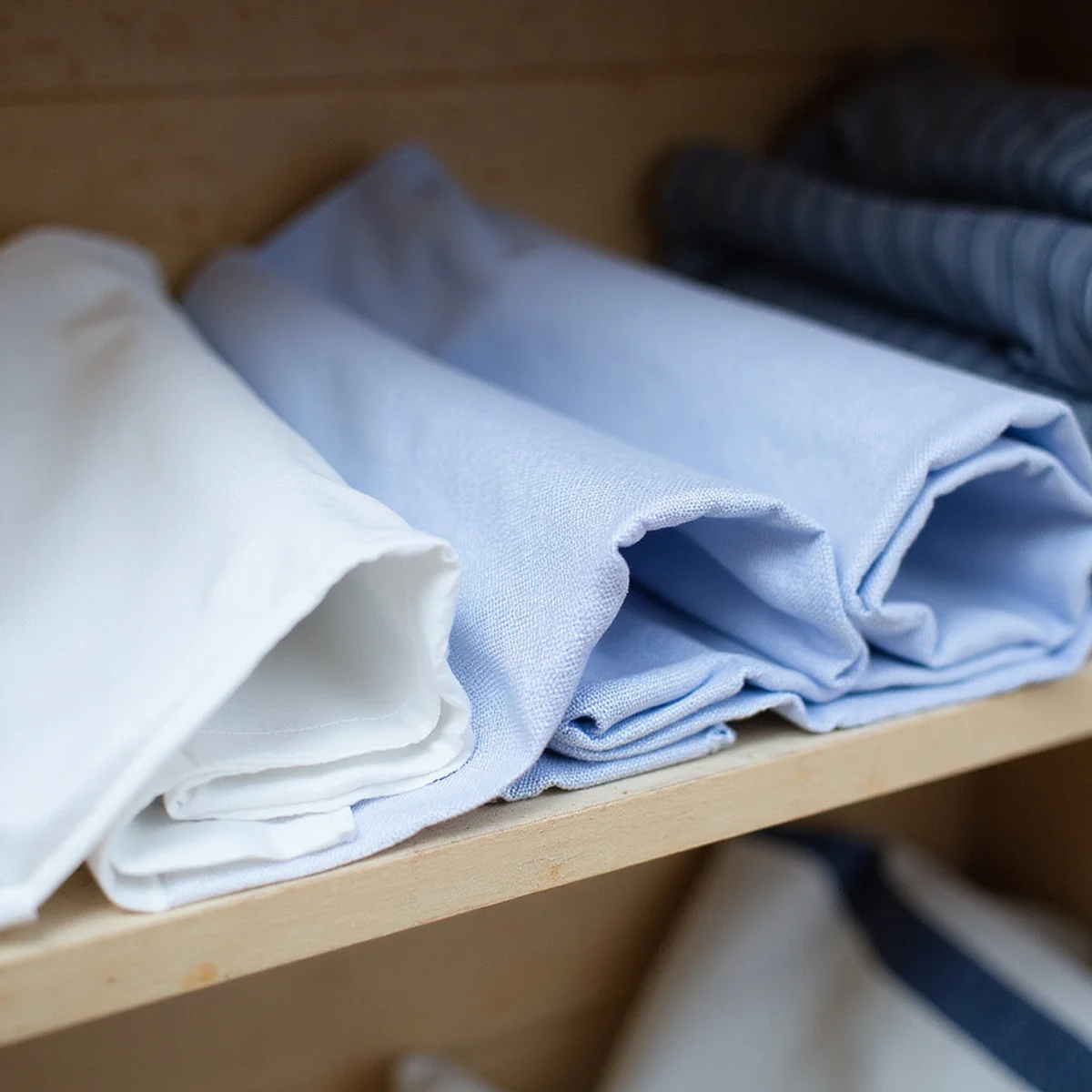 Three folded shirt cloths — Thomas Mason and Albini